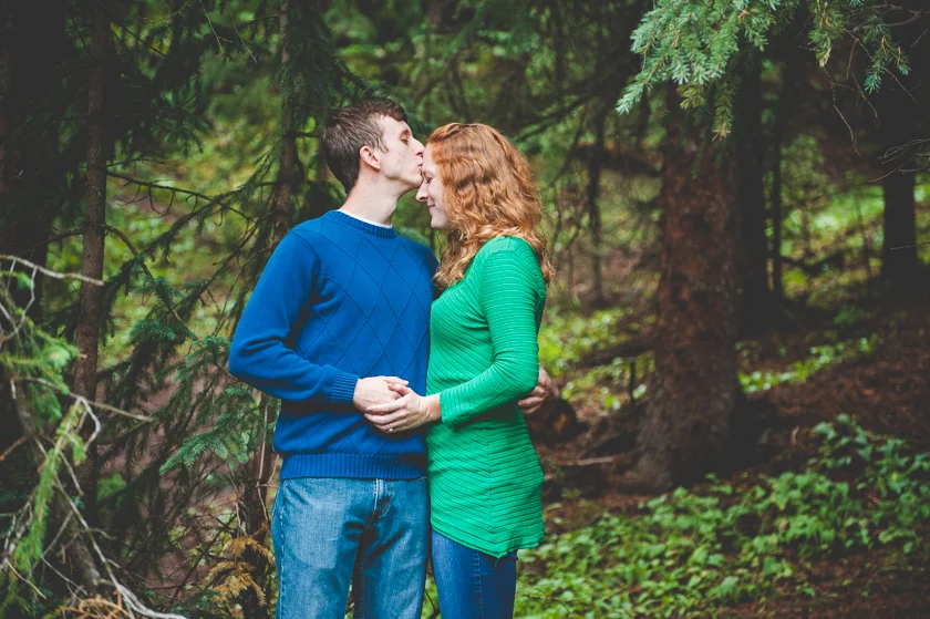 This engaged couple takes advantage of some photos together during a larger family photo session at Copper Mountain Resort.