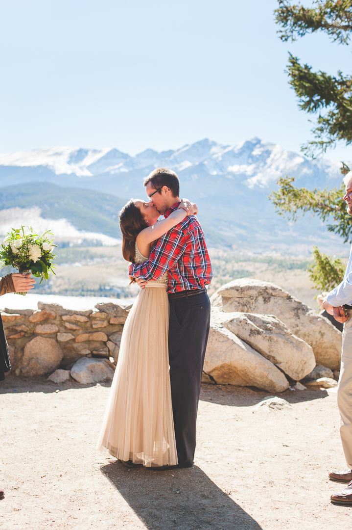 Colorado mountain elopement at Sapphire Point in the fall, with snowy mountain peaks and a blue lake below. | Keeping Composure Photography