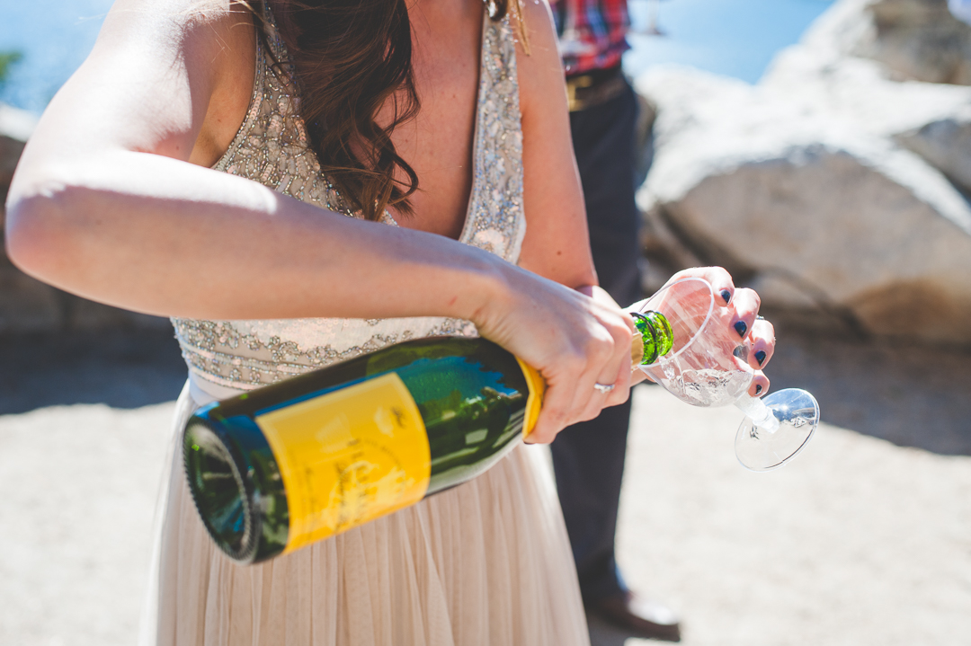 This bride came prepared with disposable champagne glasses for their post-elopement celebration! | Keeping Composure Photography