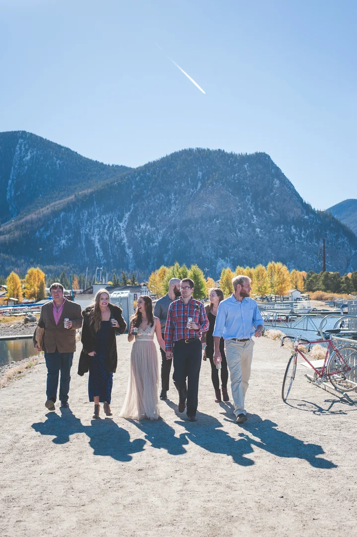 Bride, groom and their closest friends head to the Frisco Marina after a sweet and intimate elopement in the Colorado Rocky Mountains! | Keeping Composure Photography