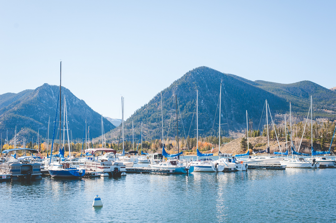 The Frisco Marina in Colorado is about as scenic a little area in the heart of the Rocky Mountains as you can find. Yellow autumn leaves still linger at the base of the mountains, and sail boats sway in the lake waiting for the winds to pick up. | Keeping Composure Photography
