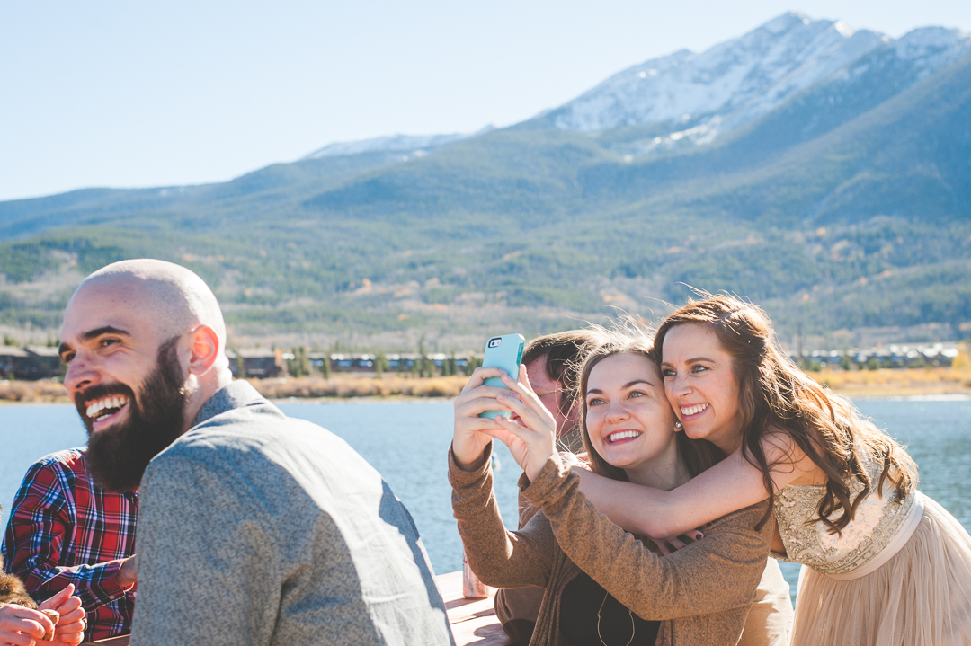 A Colorado bride captures the moment with her best friend, making sure the mountains are in the background. | Keeping Composure Photography