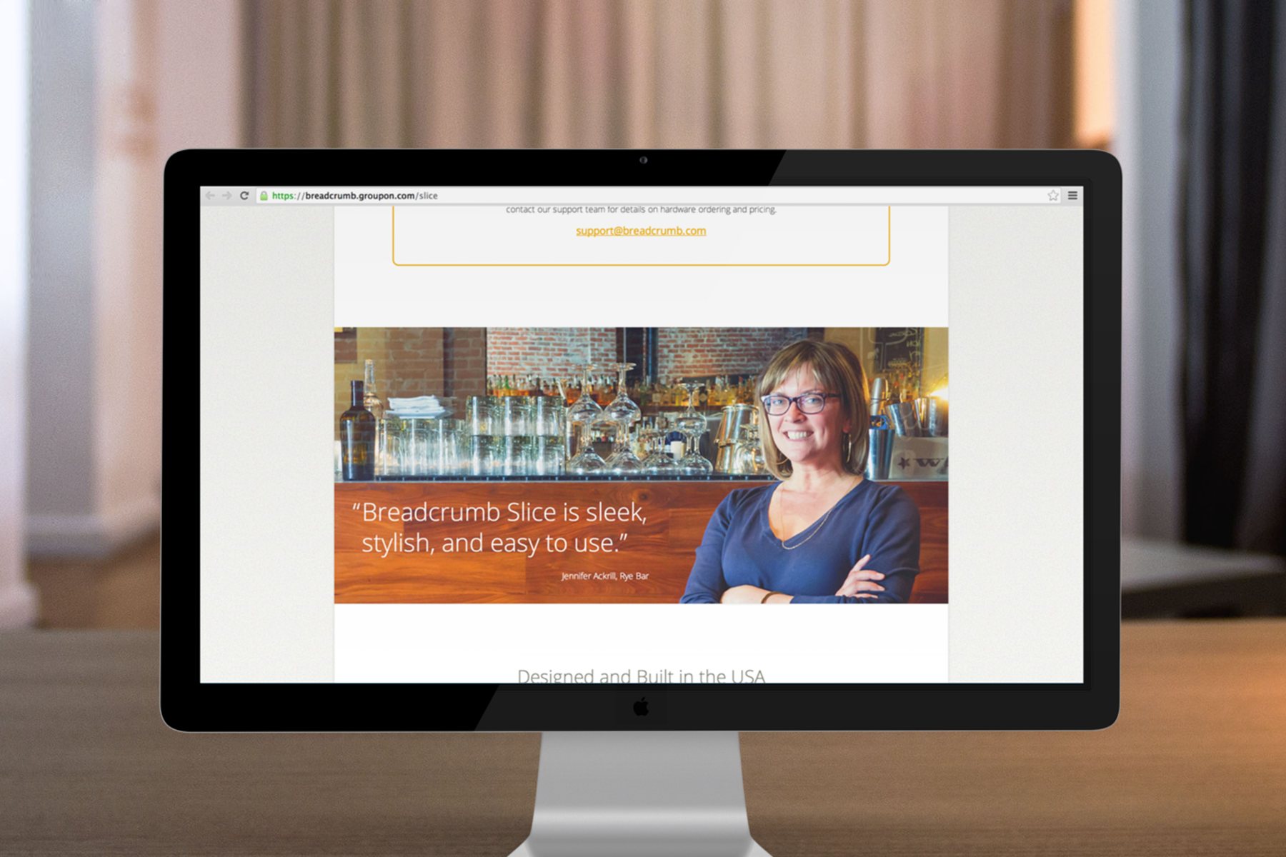 Desktop iMac screen showing Breadcrumb Point of Sale website