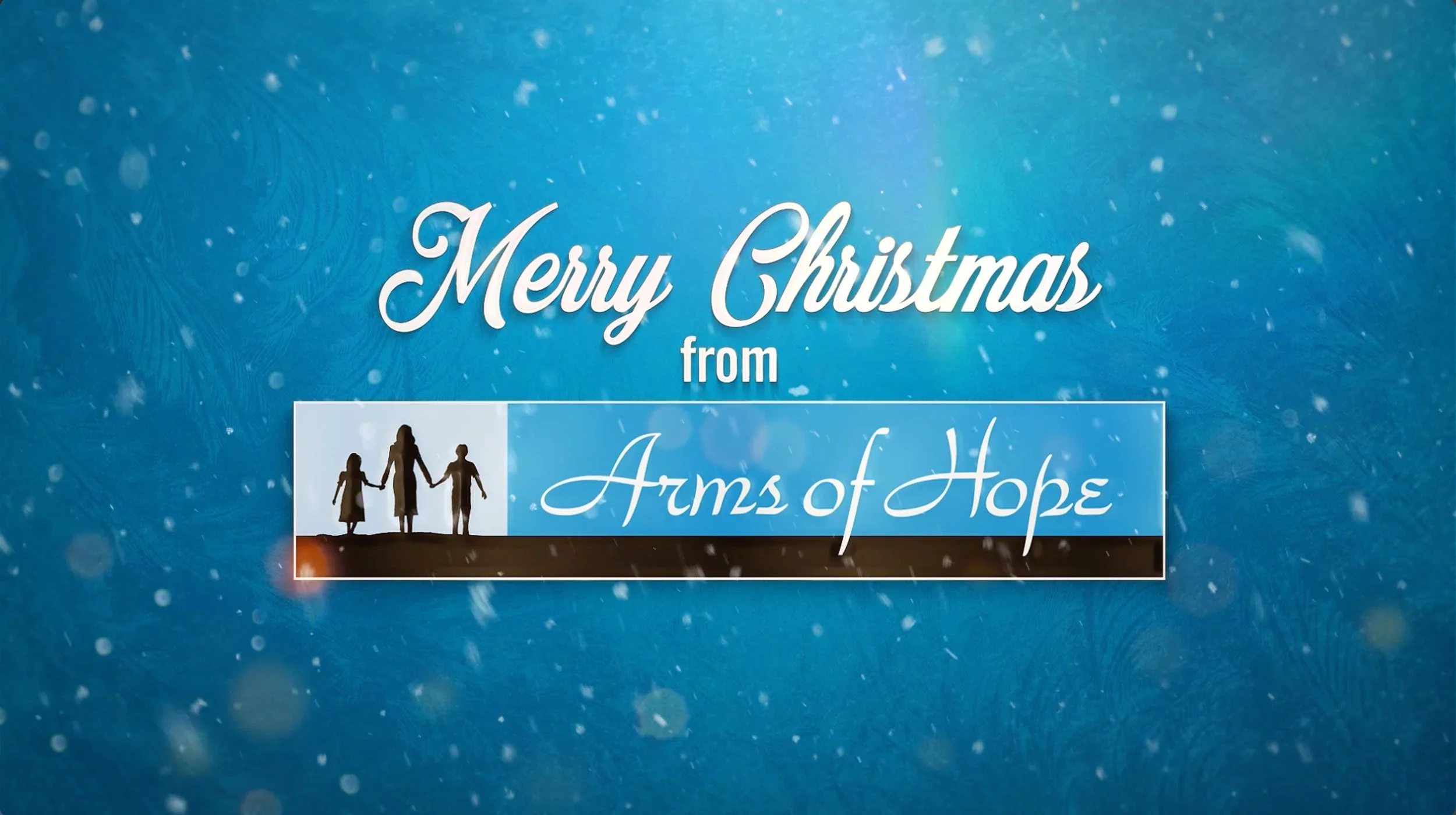 Merry Christmas title card from an Arms of Hope donor thank-you video produced in Houston