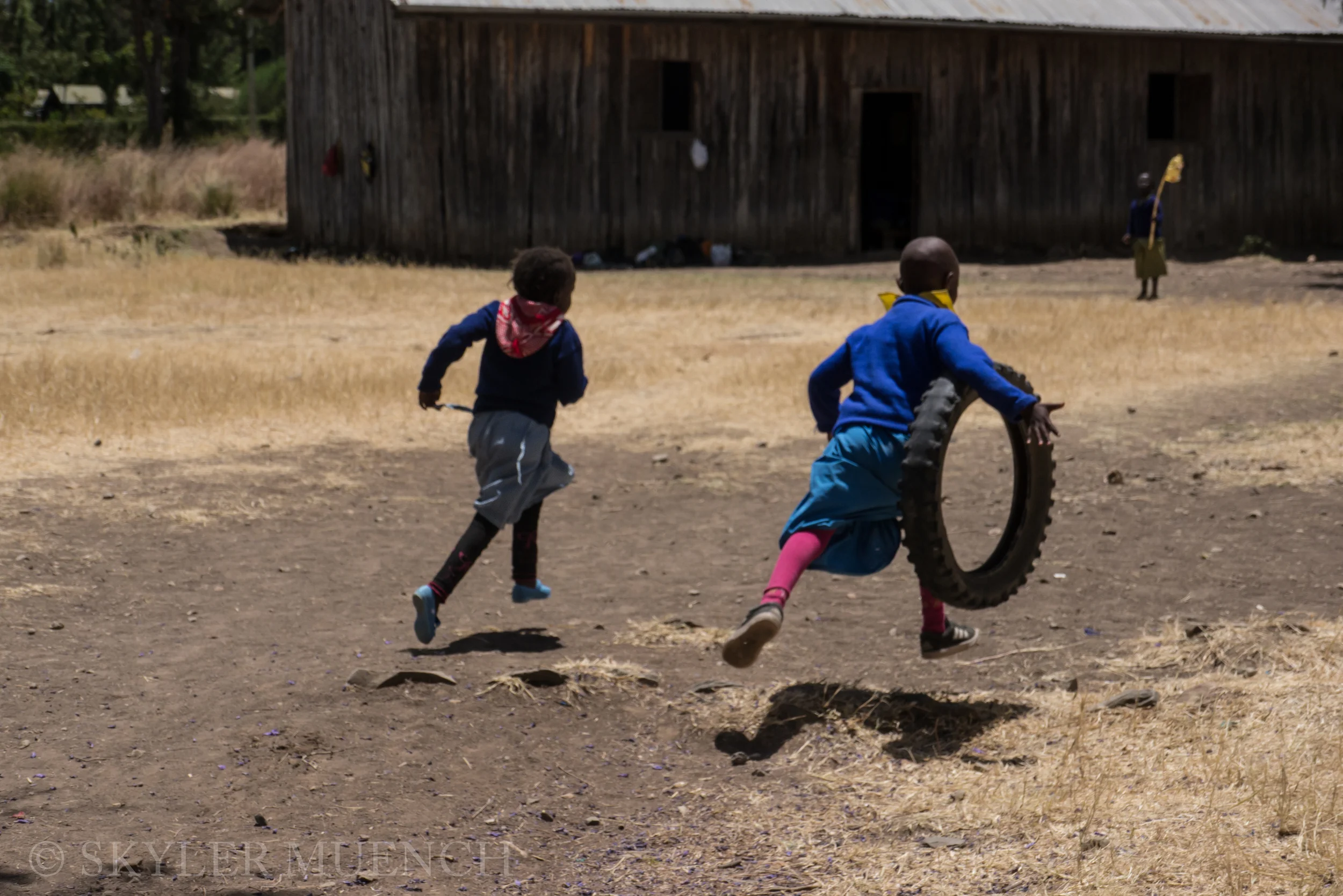 kids running with whell.jpg