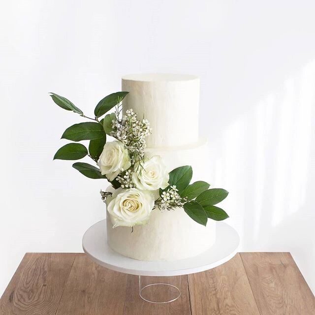 A classic wedding cake with moist carrot cake, apple, walnuts and cream cheese. This one is my attempt to create one of the beautiful cakes from Butter&amp; from San Fran &ndash; one of my biggest sources of inspiration.

I bought the flowers at the 
