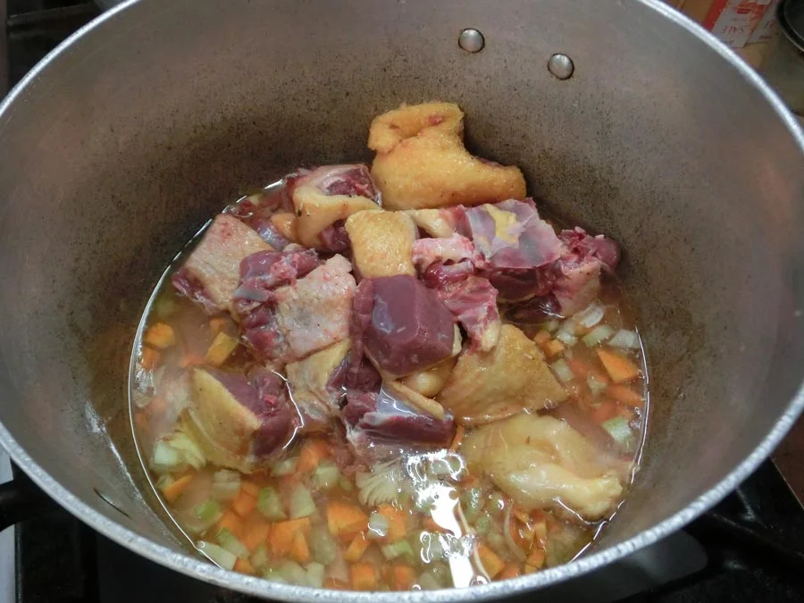 Next come oil, carrots, celery, and garlic
