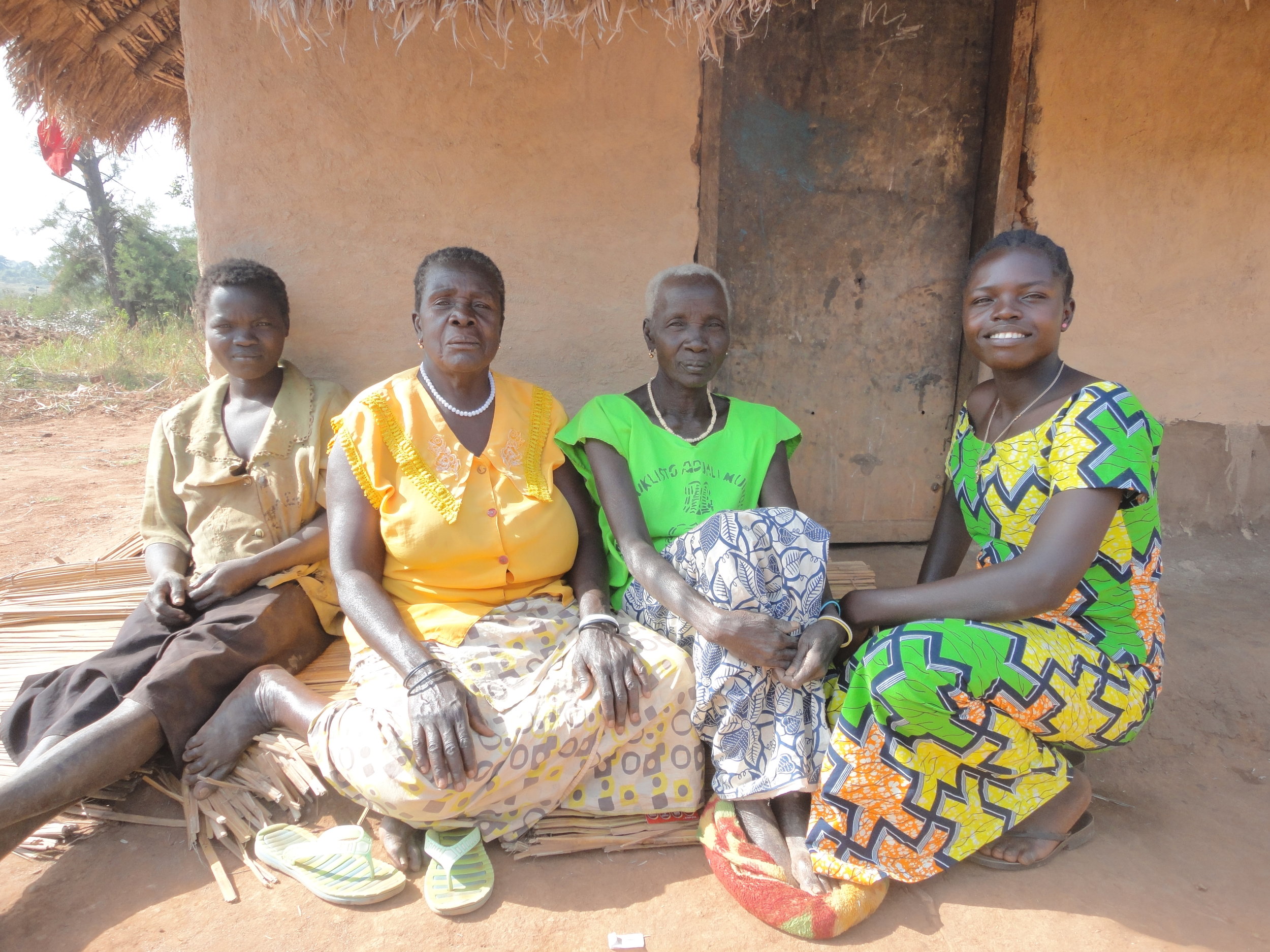 Women outside Edrako's home, neighbors.JPG