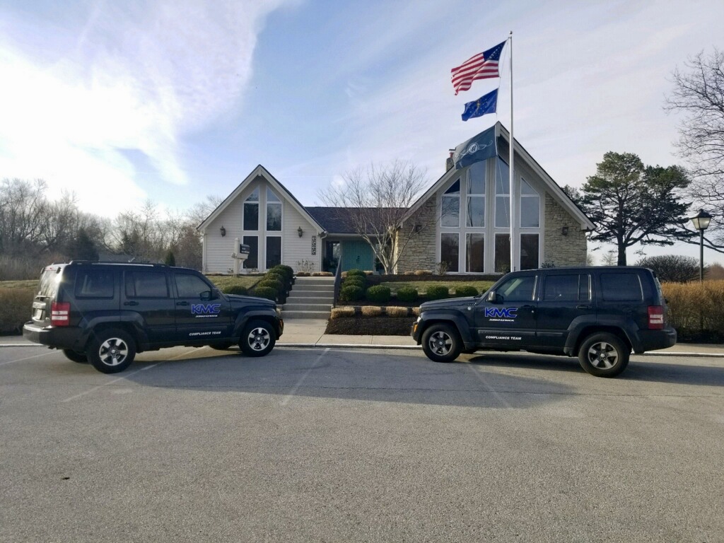 Kirkpatrick Management Company compliance team vehicles.