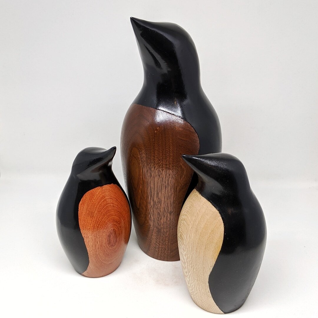 Woodturned penguins in walnut, sycamore, and rosewood. 
Inspiration courtesy of @thewoodshop.tv