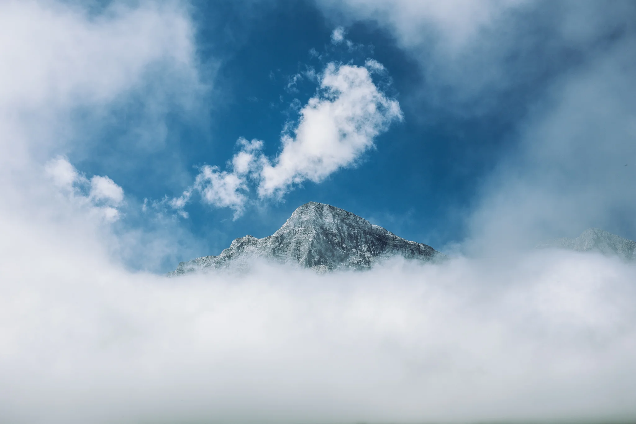Goat Mountain peeking through the clouds.