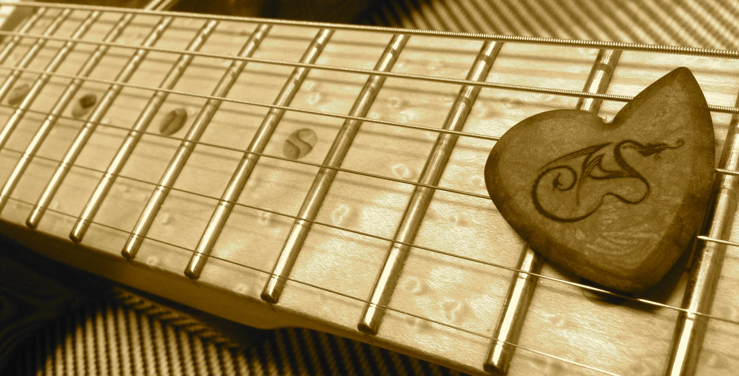 Dragon's Heart Fingerboard Sepia.jpg