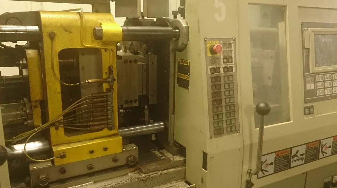 Injection mold machine.