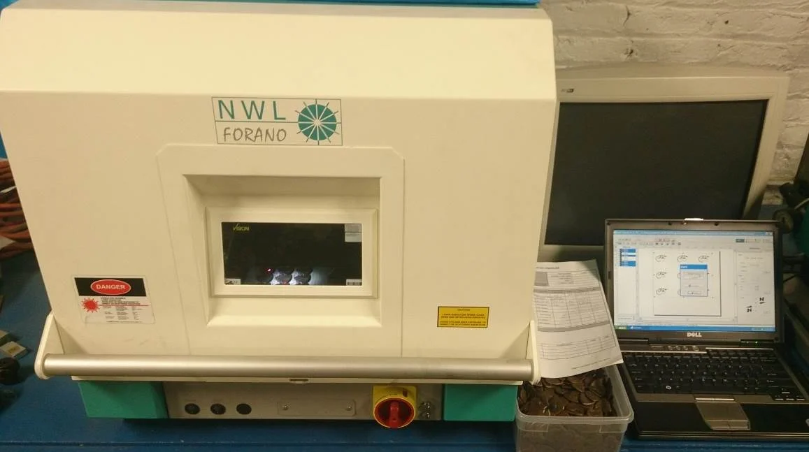 The laser etcher.