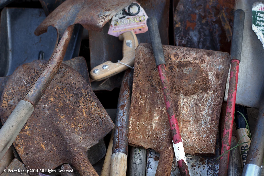Tools. Worn out, rusty tools lay in a pile at our work camp in New Orleans nearly a year after Hurricane Katrina had ripped through the Gulf. The crazy thing about the photo is it was taken on July 4, 2006! I selected it for this piece and checked the date after I edited it! Pretty cool!