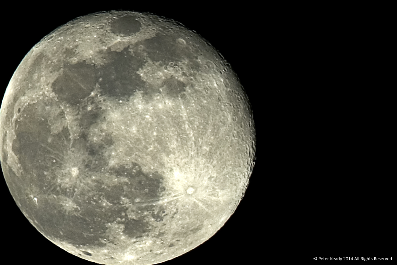 My photograph of a full moon. Taken a bit ago with a telephoto lens and digital camera body. Could our quest for stuff "out there" really be a search for something "in here"?