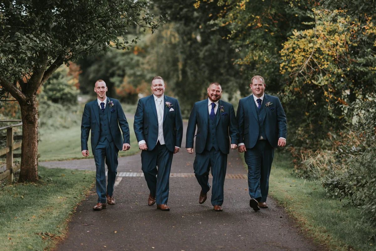 groom groomsmen wet wedding