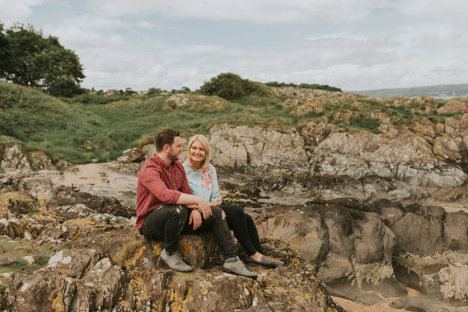 Couple walking together through Crawfordsburn Country Park