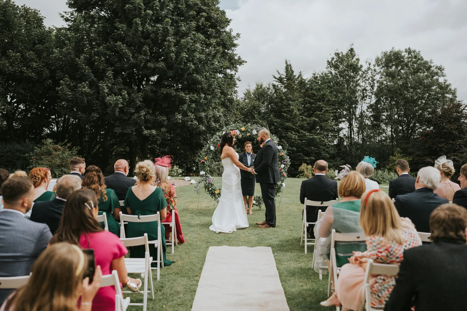 Outdoor wedding ceremony at Breckenhill, County Antrim, photographed by Pure Photo N.I
