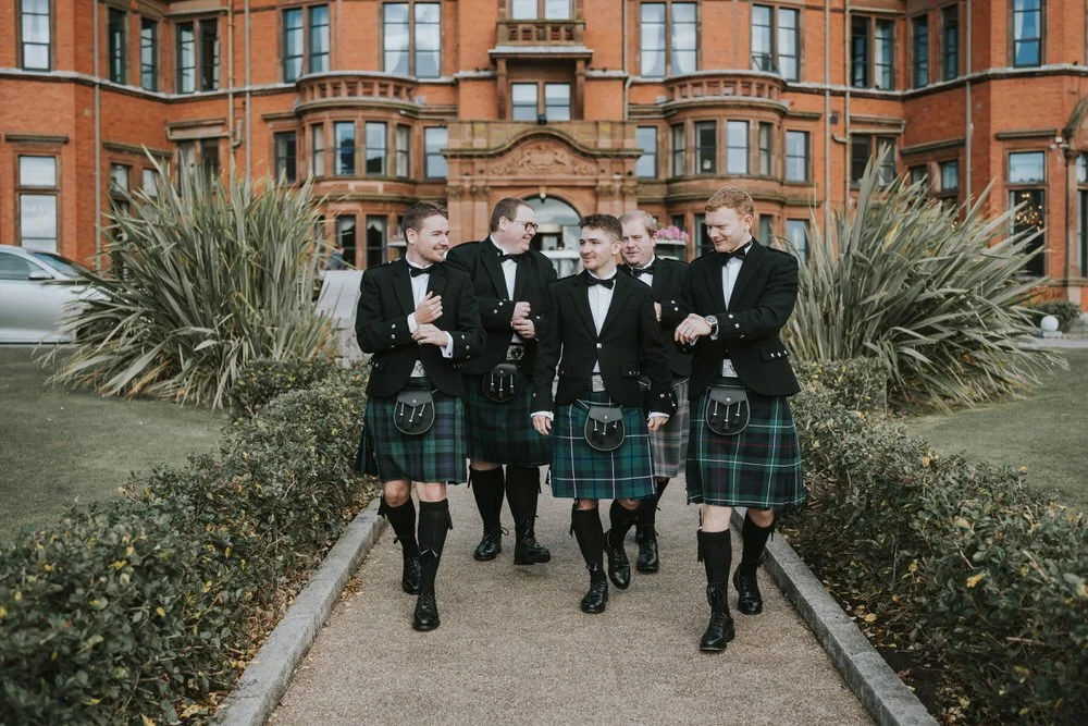 Groom and groomsmen in the grounds of Slieve Donard Resort and Spa