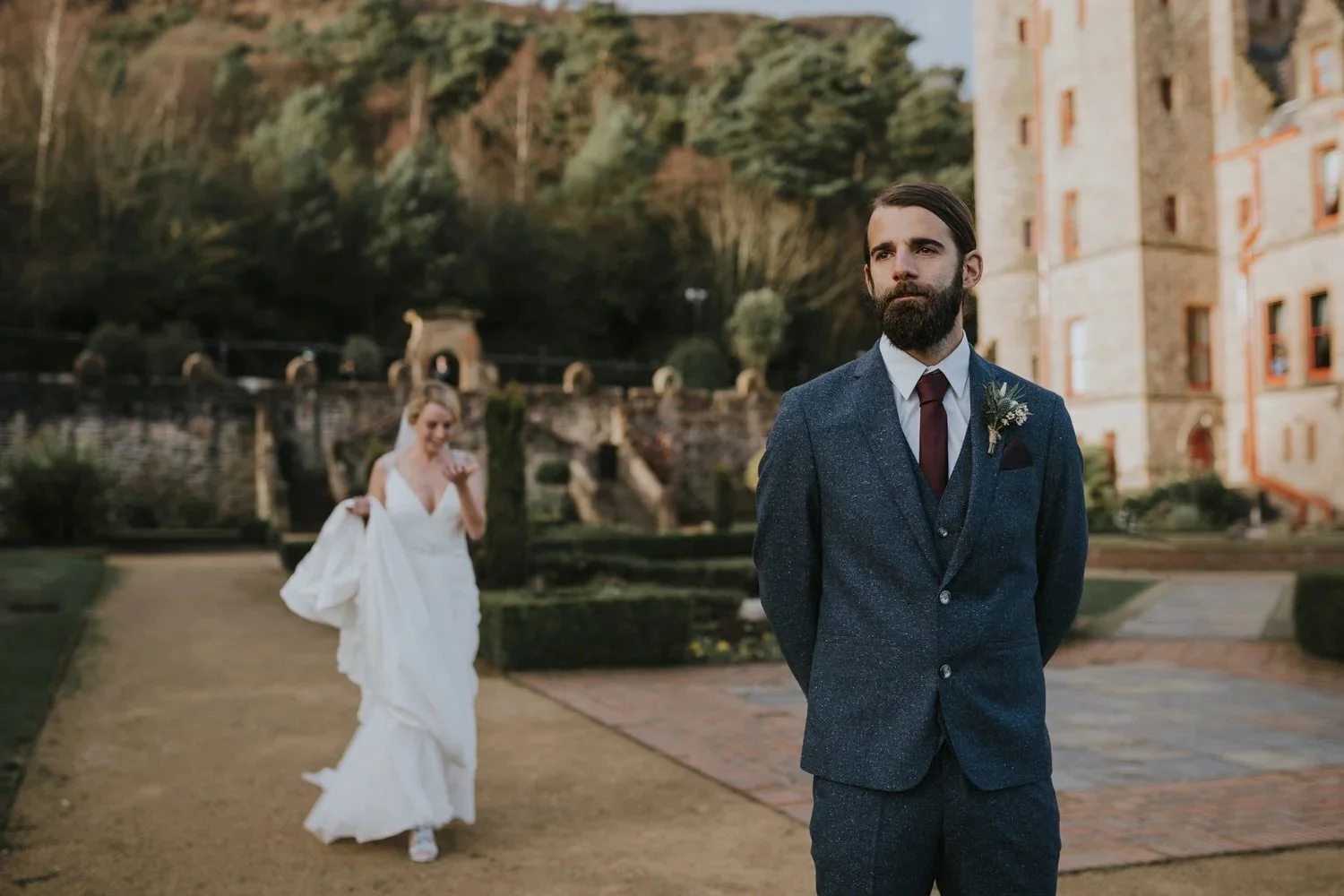 Groom emotional as his bride approaches for their first look in the castle grounds, photographed by Pure Photo N.I
