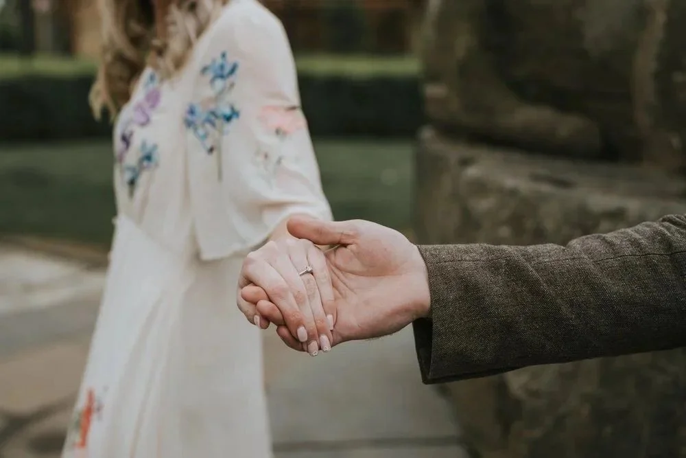 Newly engaged couple holding hands in northern Ireland