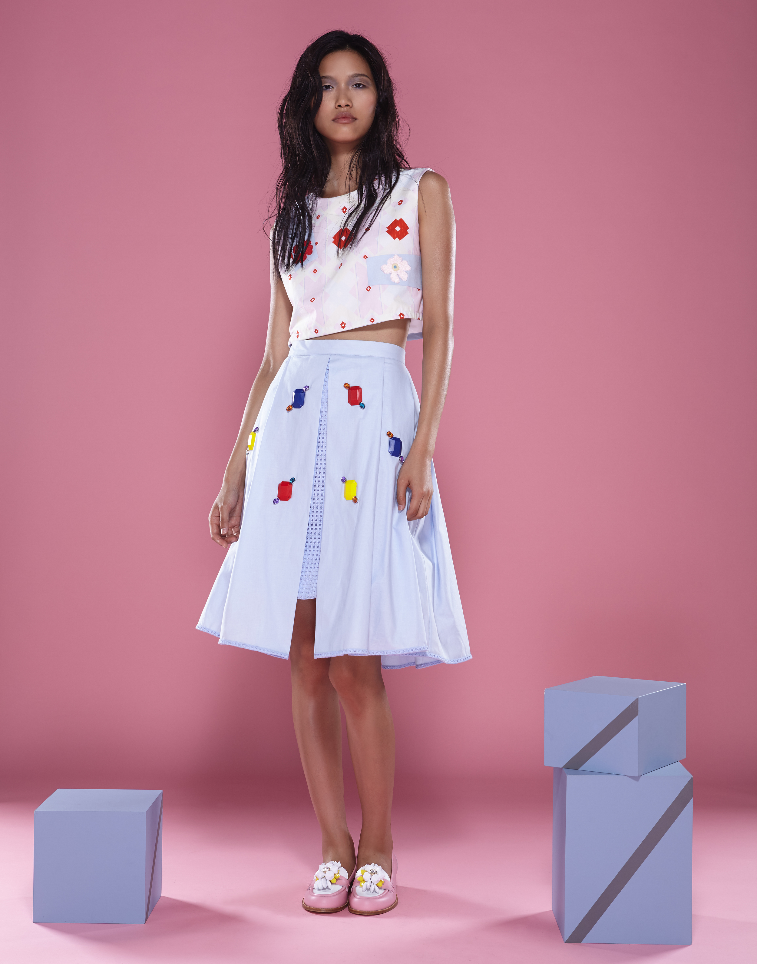 TOP: 100% COTTON CROPPED SLEEVELESS TOP WITH BAND PATCHES. SKIRT: 100% COTTON EYELET FRONT SLIT MIDI SKIRT WITH EMBROIDERIES.