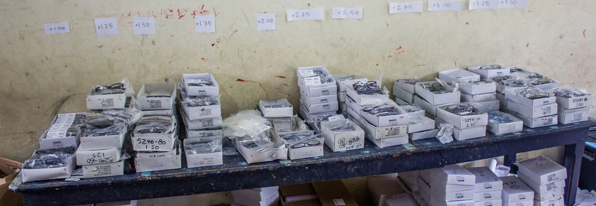 Donated eyeglasses that have been sorted, cleaned, packaged, labelled, and sent to Colombia from the warehouse in Ontario.