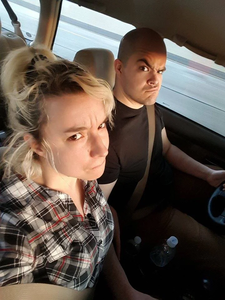 Lizzie & Peter sitting in a Sebring: S.I.N.G.I.N.G.