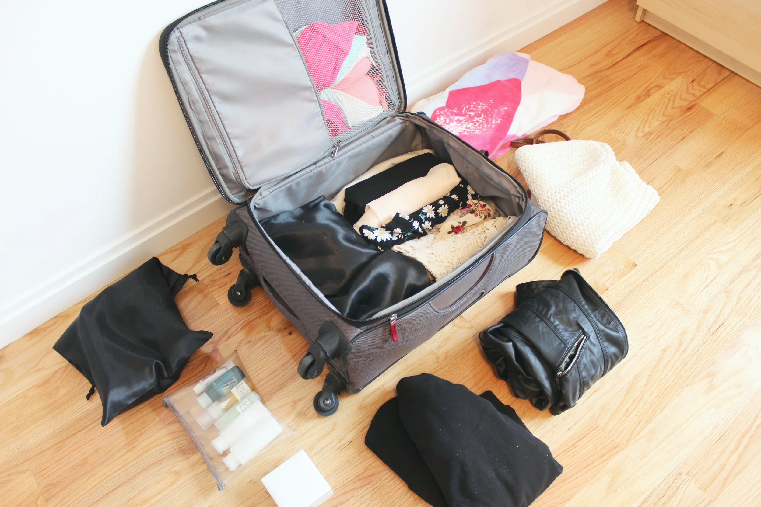 Halfway through the process: shoes at the bottom, and all clothes rolled up