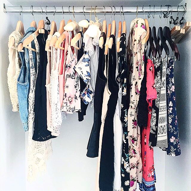 Filling up the suite's closet with my floral wardrobe