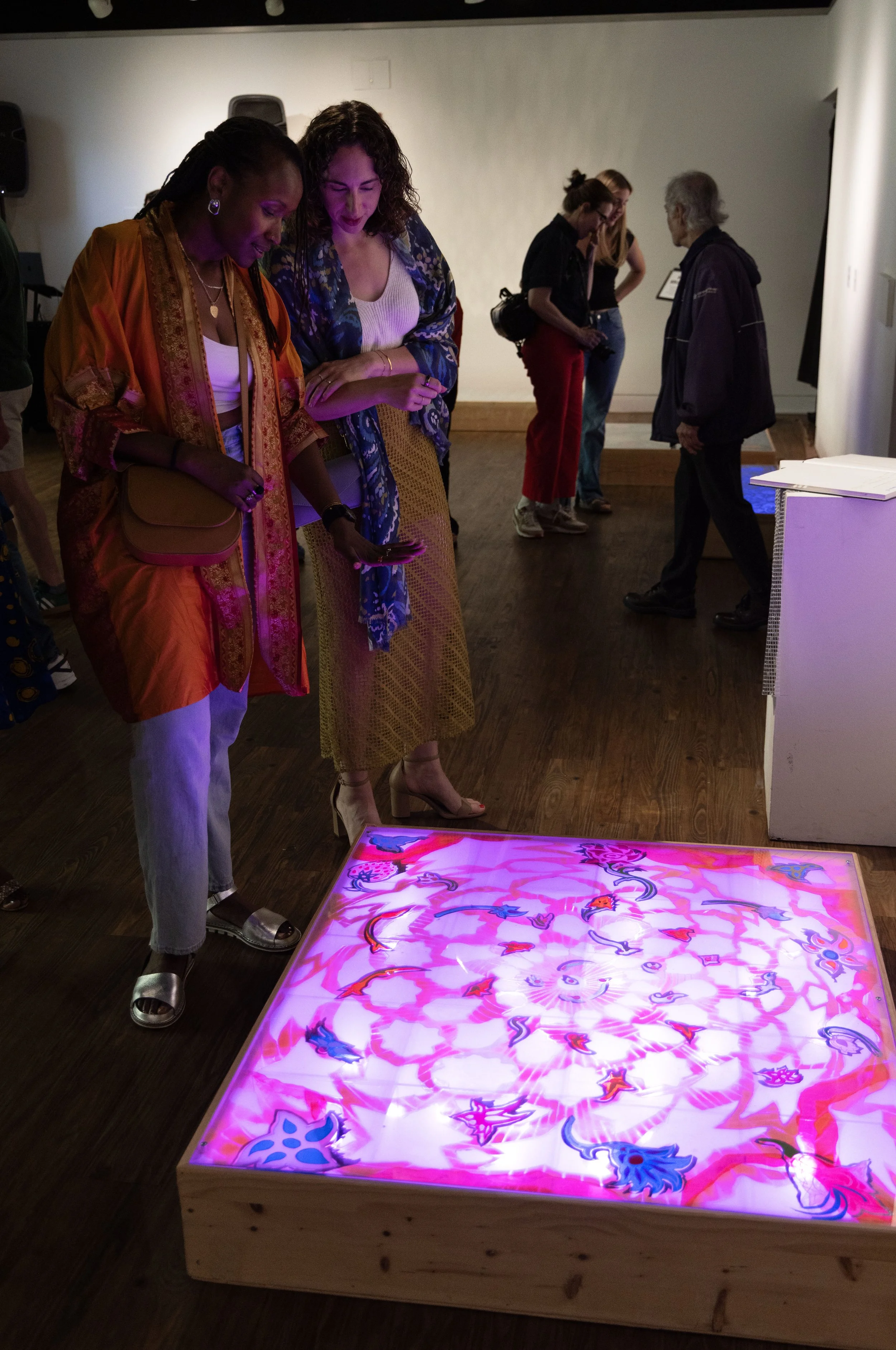  Color-changing lights within the platforms enhance the feeling of pulsation and rhythmic movement in the Persian-inspired patterns and colors. This project offers an embodied understanding of festive, soulful aspects of Iranian culture and humanity 