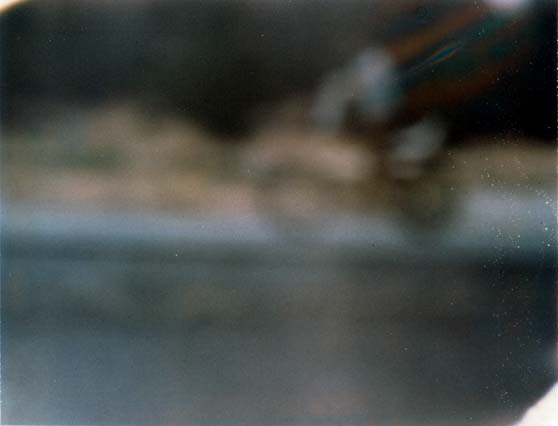 Caught in the Spokes, Polaroid, 2002