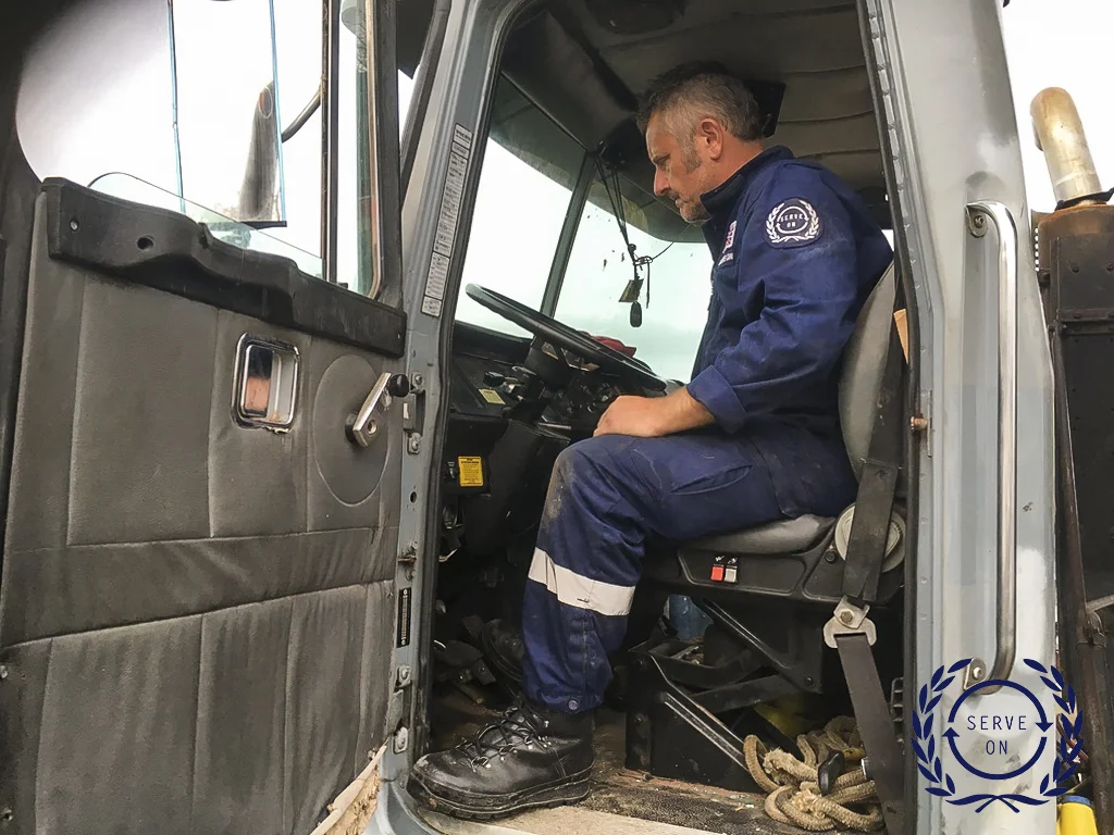 Serve Ons Garry Wonnacott fixing a Garbage truck to assist with the removal of debris and waste
