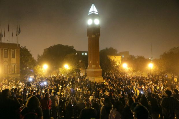 Protestors gather around the clock tower at SLU late Sunday night. Photo by David Carson of the St Louis Post-Dispatch . 
