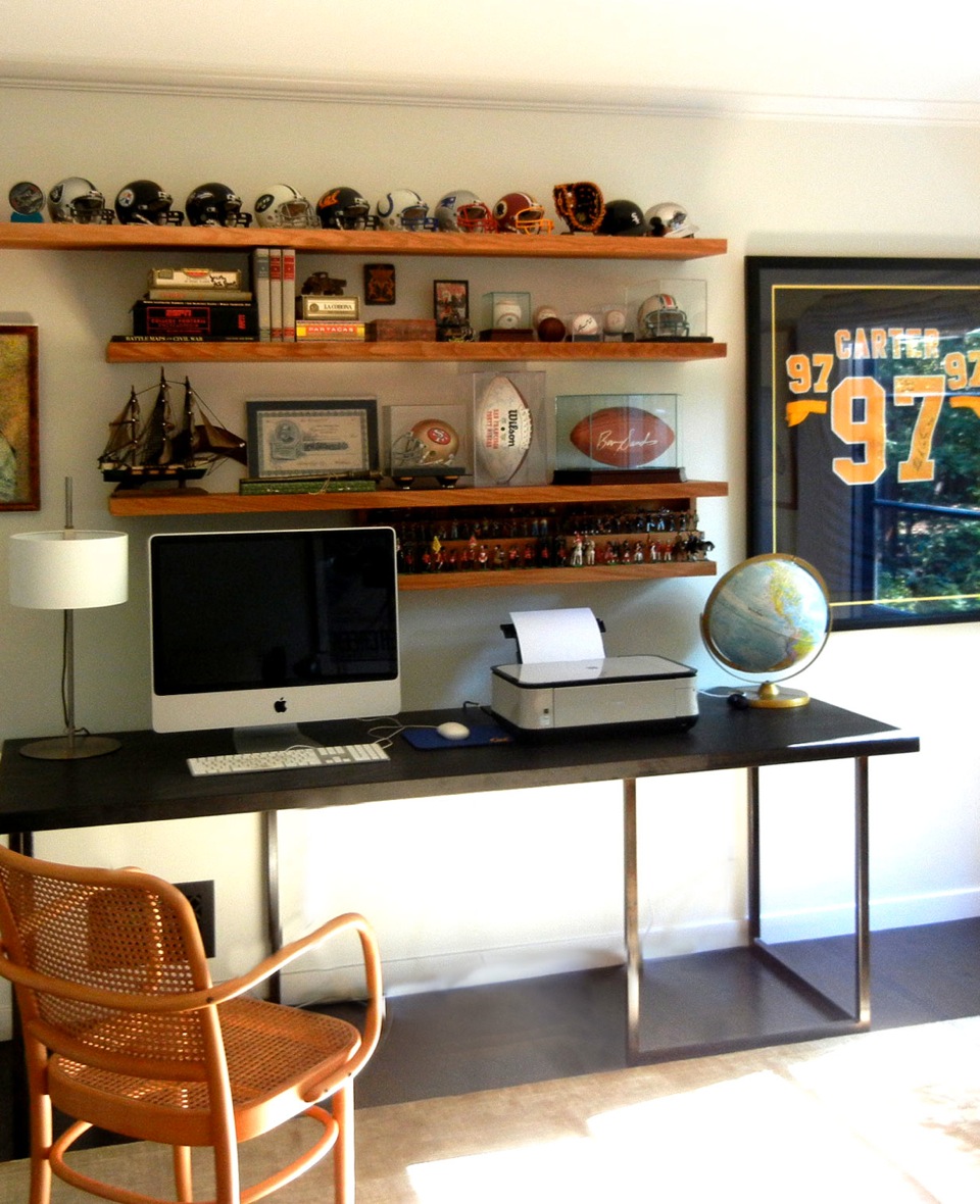 Custom design shelves display sports memorabilia and lead soldiers collection. Photography: IBID