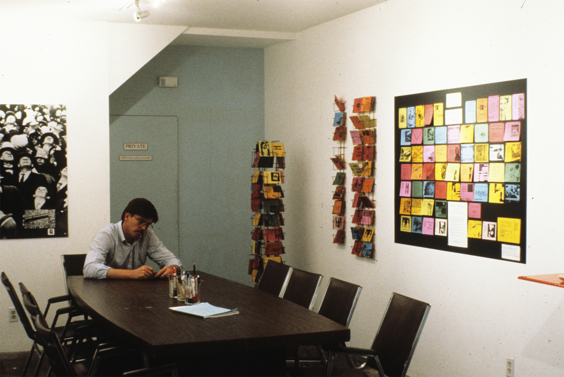 ART PROTECTION SERVICES: Karen Atkinson and Associates, ARTtorneys At Work. Viewer filling out the postcards created for all those on the National Endowment for the Arts Reauthorization Committee.