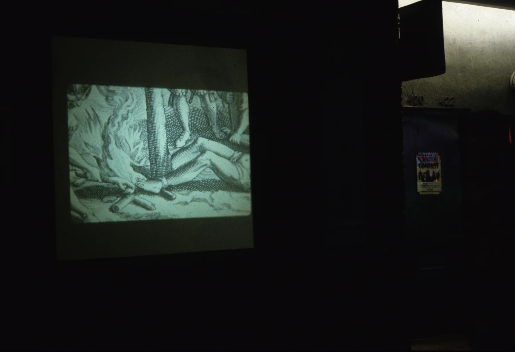 Projections In Public: New York City. The project was projected through the theater doors onto 42nd Street at night.