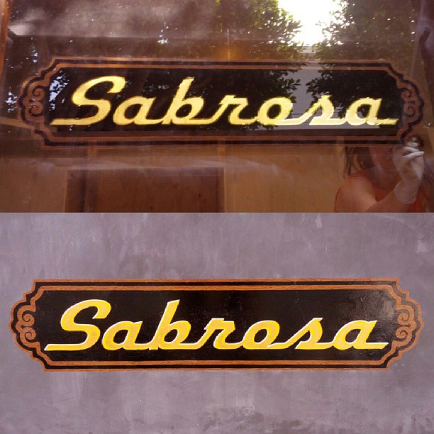 WINDOW-sabrosa-window-sign-and-wall-sign-with-pickleshyperbole-razoring-the-last-bits-of-excess-from-the-window_10146772103_o.jpg