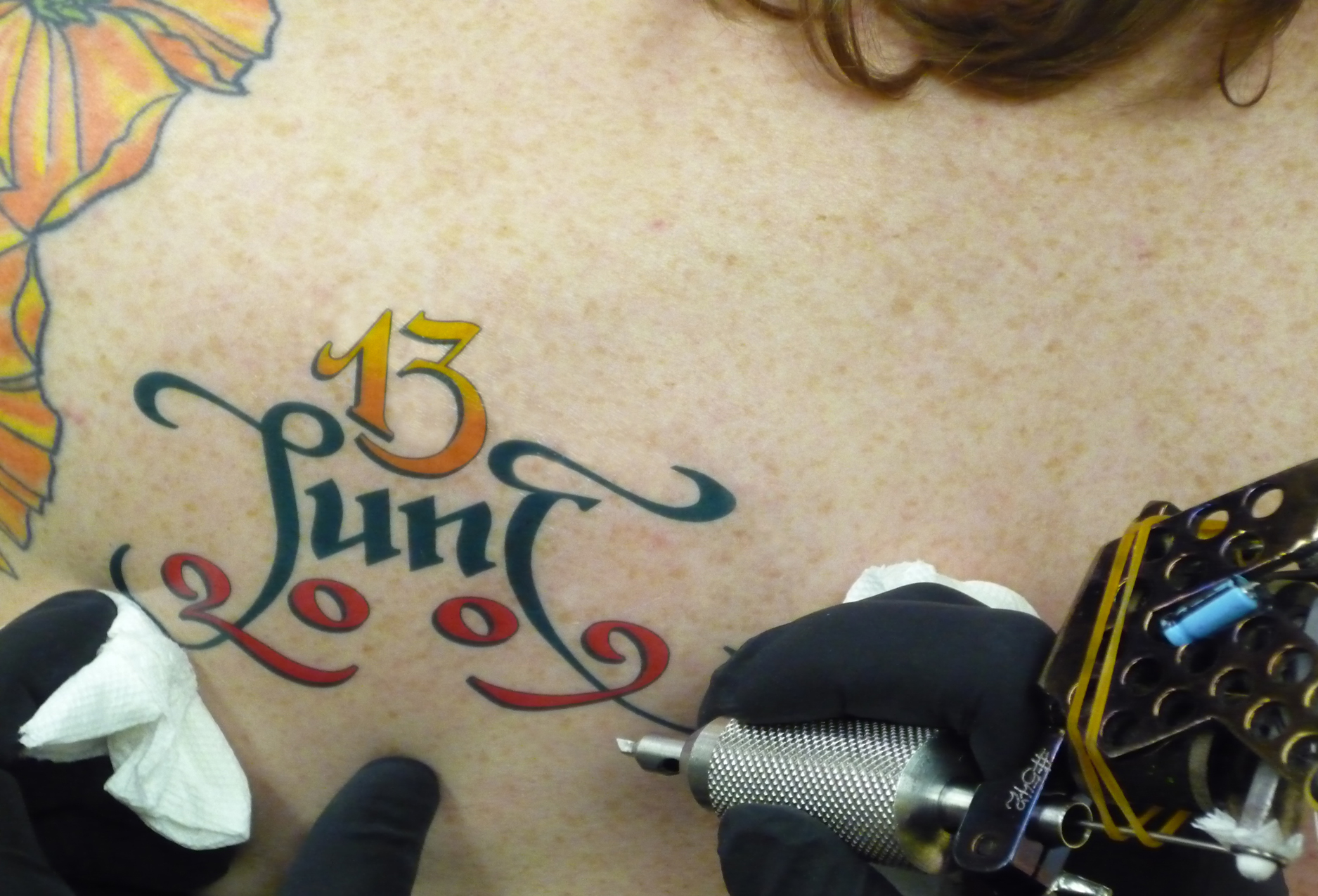 ORIG-tattoo-close-up-with-gun_3373572670_o.jpg