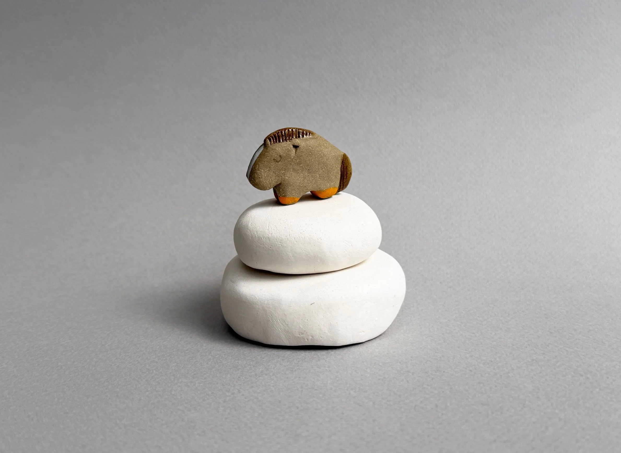 Fire Horse mochi for the new year, intense orange hooves