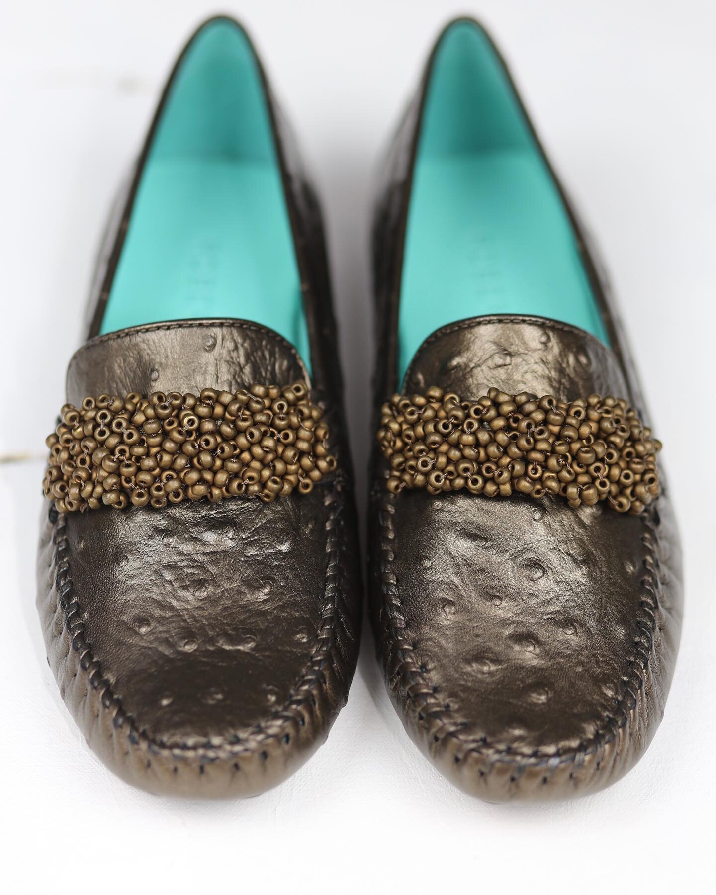 Cosmos in Bronze Ostrich. Lined in aqua True Glove. Adorned in Japanese beads. Perfect.