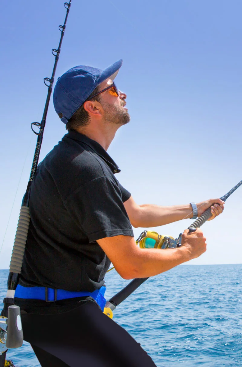Man fishing fishing off Warrior Hardtop