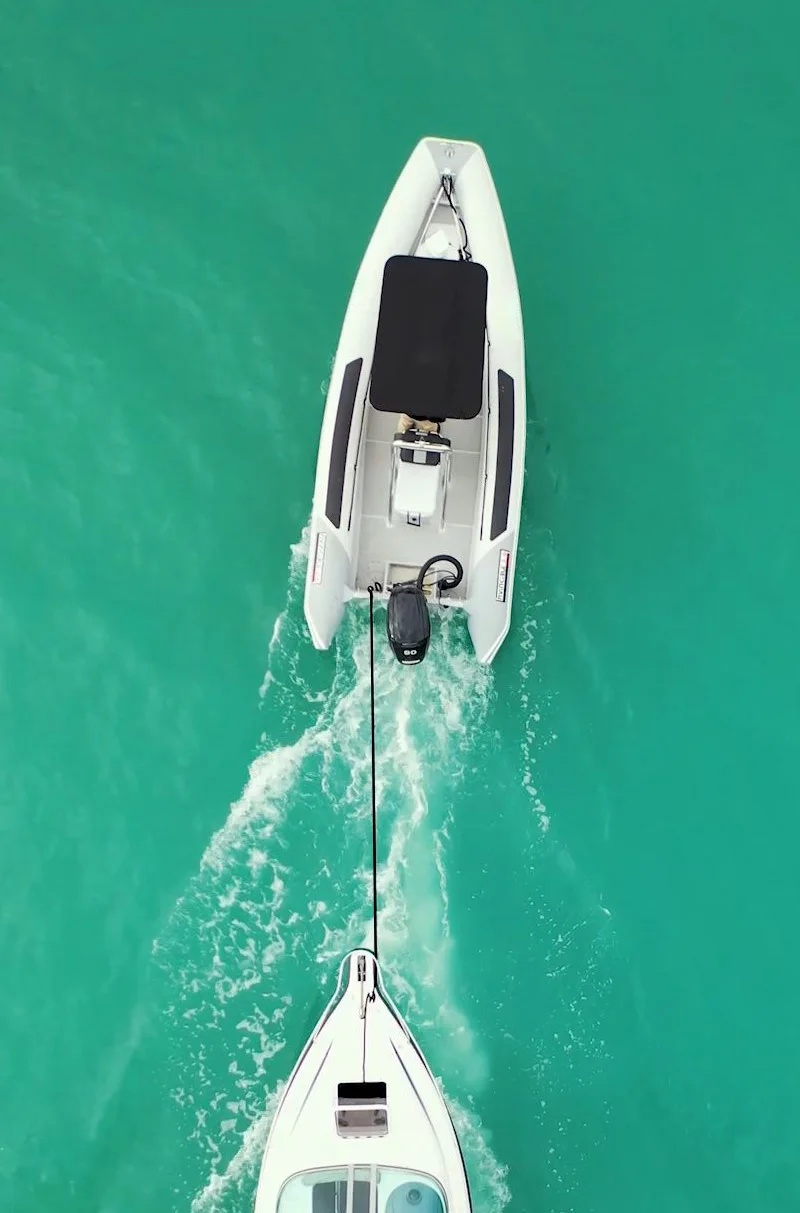 Fi-Glass Invincible RIB towing another boat