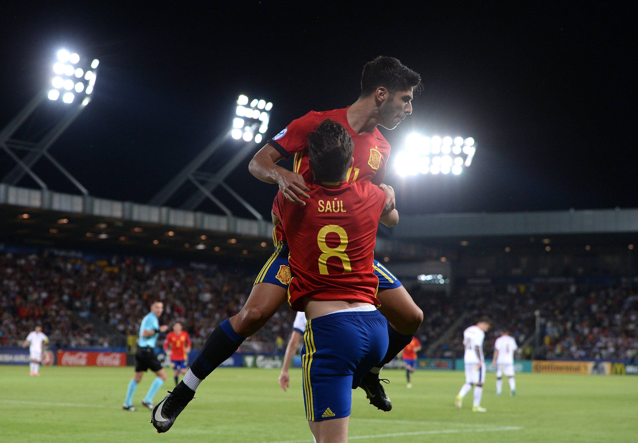  Marco Asensio of Spain celebrates with Saul Niguez after Saul scored their side's third goal against Italy in the semi-final match in Poland 2017 /  UEFA / Sportsfile  
