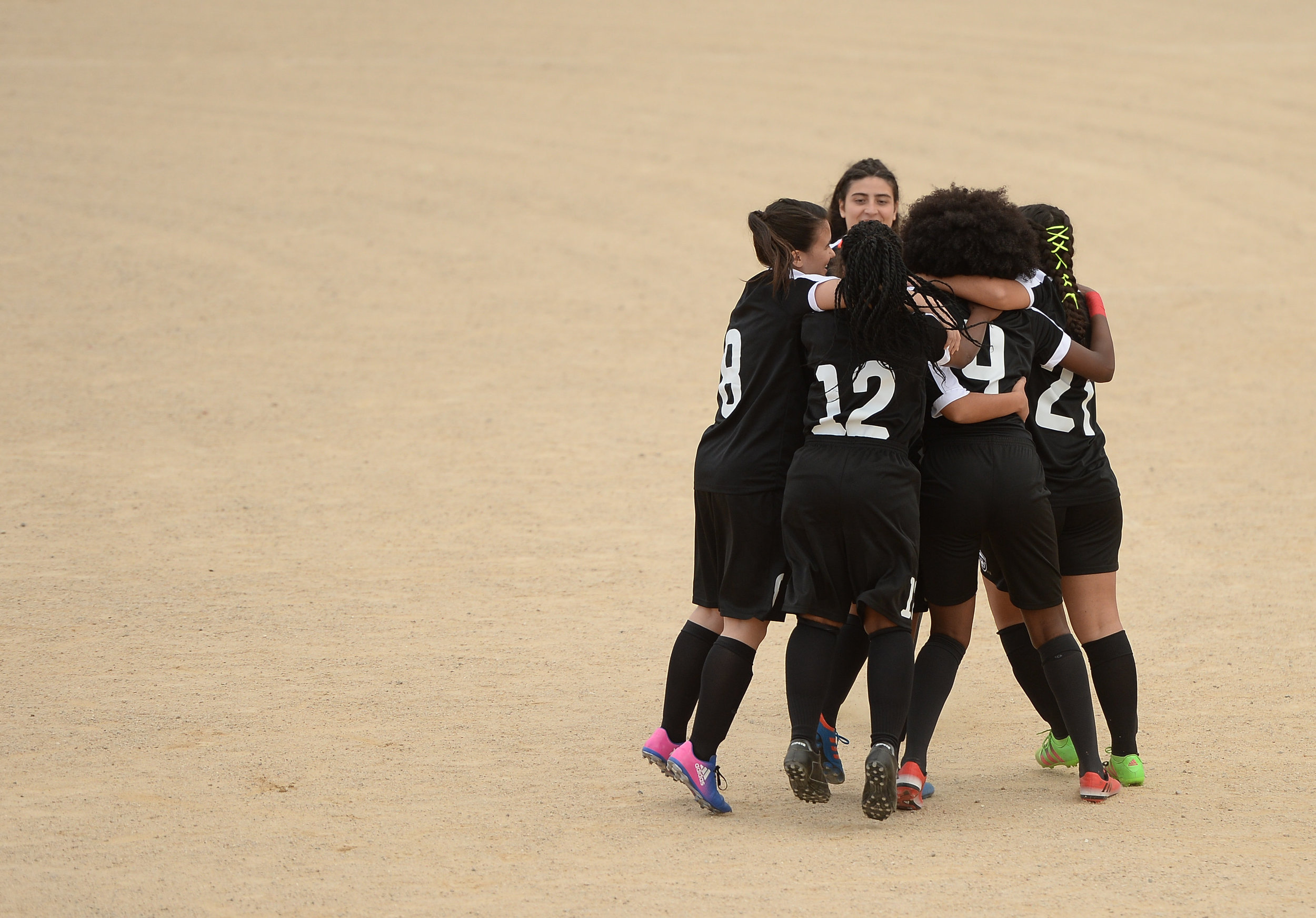  Youth players huddle together before a match in outside Lisbon,&nbsp;Portugal 2017 / UEFA / Sportsfile  