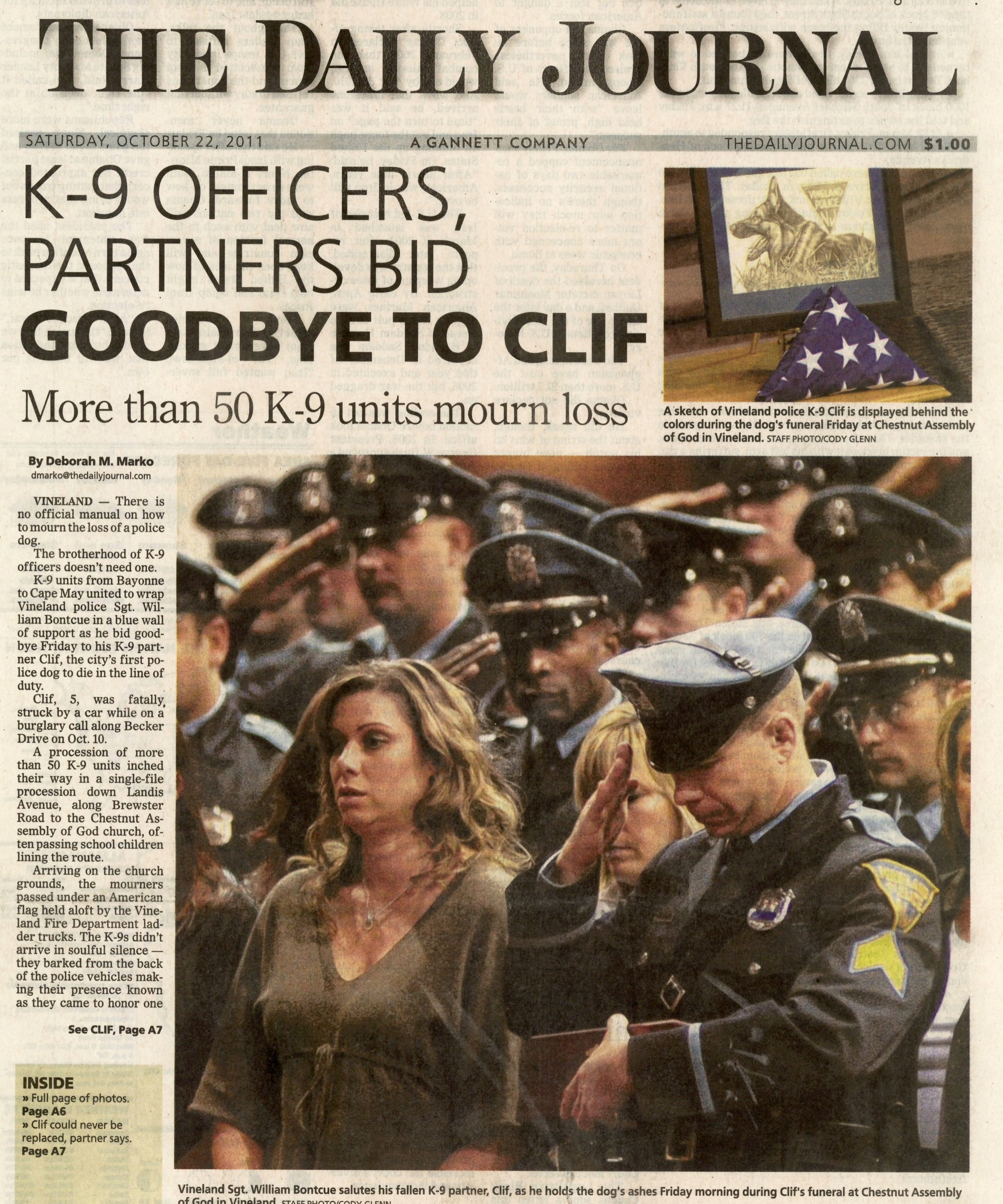  Vineland Police K-9 Officer salutes his late partner Clif during a memorial service October 22 2011 /  The Daily Journal  