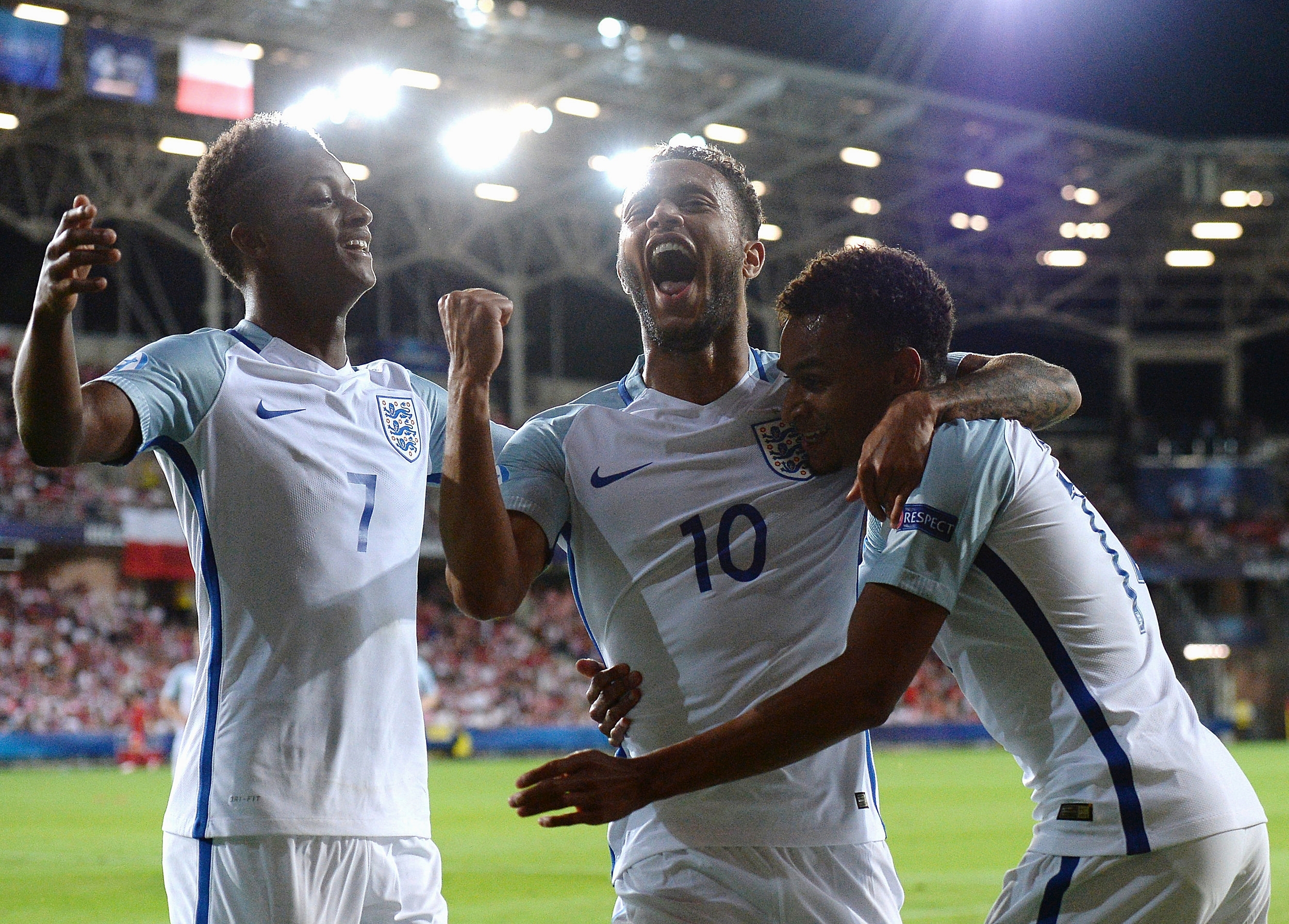  Jacob Murphy, right, of England celebrates with team-mates Demarai Gray, left, and Lewis Baker after scoring his side's second goal against Poland in Poland 2017 /  UEFA / Sportsfile  