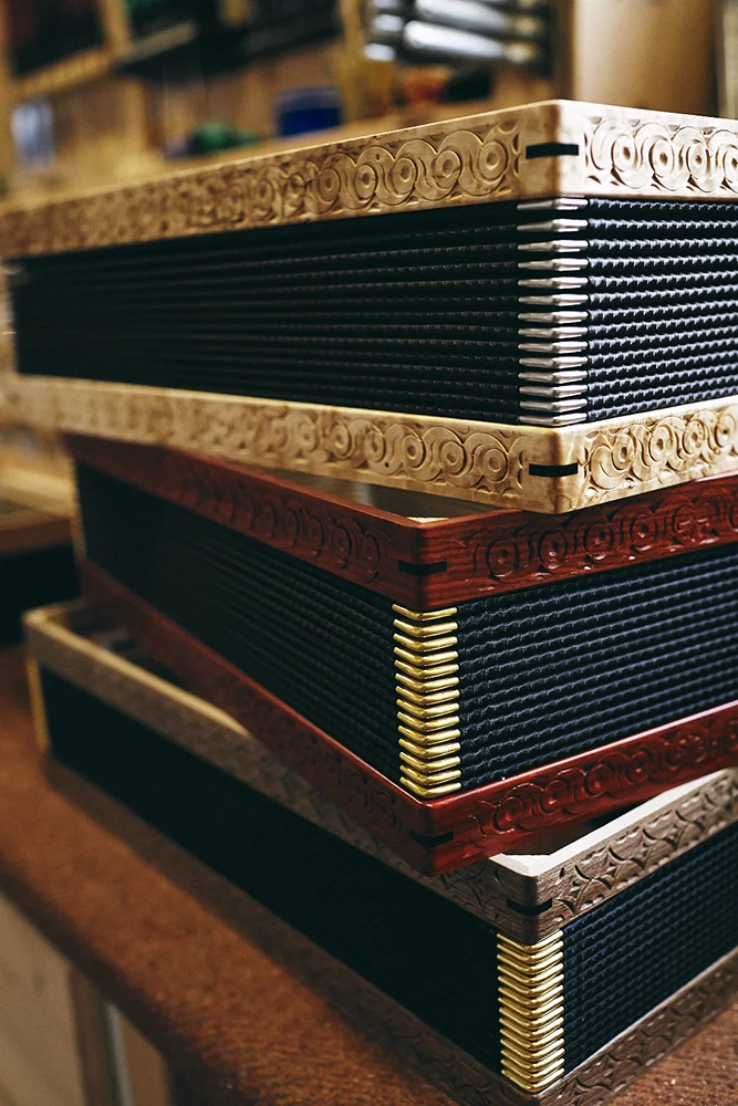 Documentary and portraits of a young craftsman producing accordions