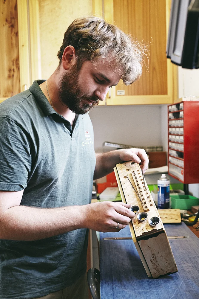 Documentary and portraits of a young craftsman producing accordions